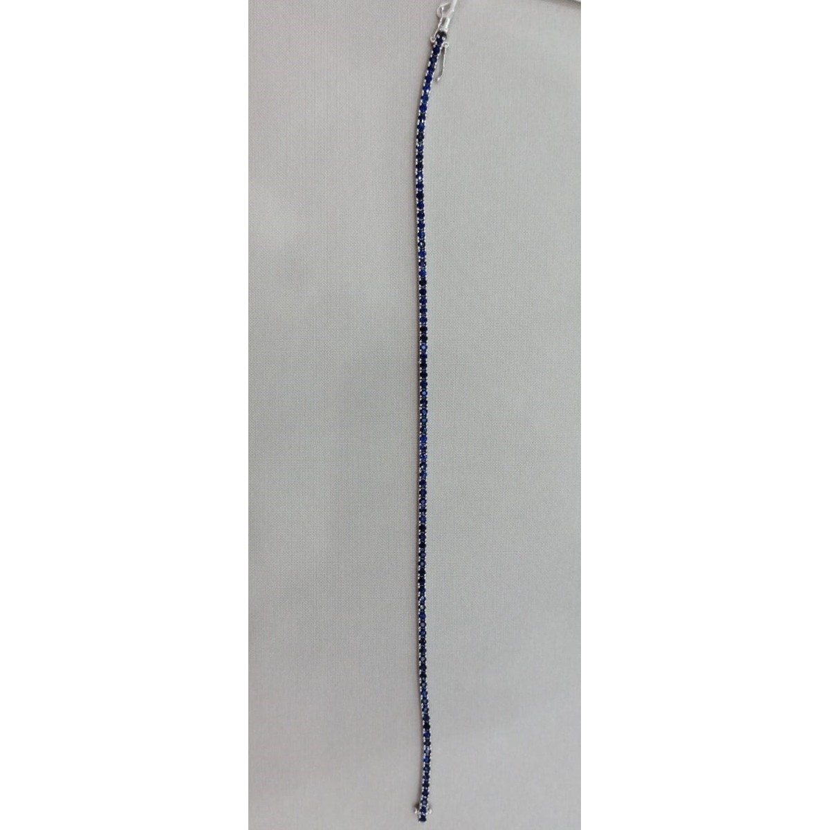 BRACCIALE TENNIS IN ORO BIANCO 18 K CON ZAFFIRI NATURALI